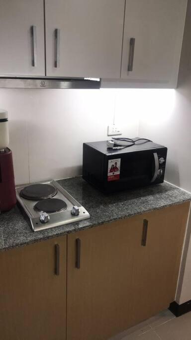 Casa Antonio At Uptown Parksuites Tower One Bgc Манила Экстерьер фото